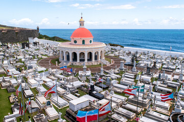 Old San Juan, Puerto Rico - beautiful seaside cemetery is adorned with flags from Puerto Rico's...