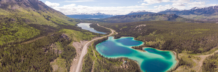 Stunning turquoise green lake in northern Canada, Yukon Territory. Emerald Lake located outside of...