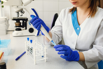 Doctor in the laboratory conducts analysis.

