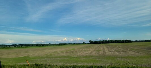 landscape with blue sky and clouds