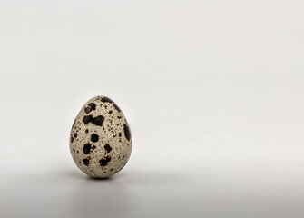 Quail egg isolated on white background