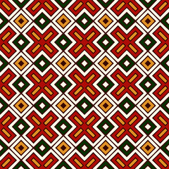 Seamless pattern in Christmas traditional colors. Repeated geometric forms bright ornamental abstract background.