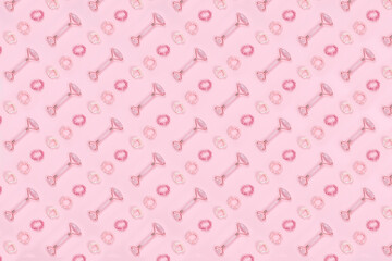 Pattern of jade roller and pink hair accessories. Beauty and self care, time for self, girly time concept. Place for text