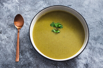 plant-based food, vegan green soup with potato onions and leek