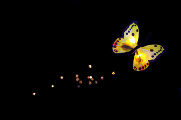 Cosmic Butterfly leaves a trail of light behind it