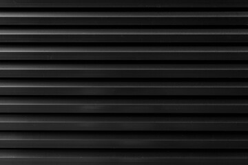 Black Corrugated metal background and texture surface or galvanize steel.