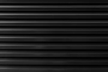 Tuinposter Black Corrugated metal background and texture surface or galvanize steel. © torsakarin