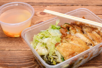 fast food of deep fried chicken with rice and cabbage and soup