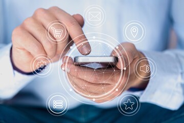 Man with phone and digital tablet.