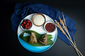 Zongzi and raw materials for Dragon Boat Festival, a traditional Chinese festival. Zongzi in Dragon...