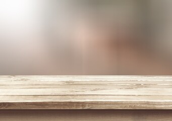 The wooden empty table top on blur background