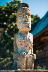 Canibals village on lake Toba in Sumatra, statue of man