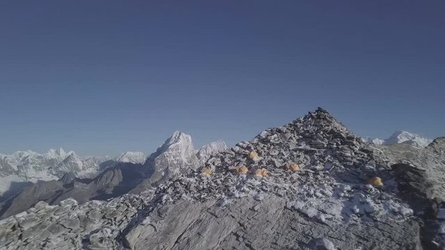 peak Ama Dablam and village Periche - Mt/ Everest region, Nepal. Aerial view of a climbers camp.