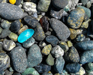 Sea Glass On Ocean Beach with Stones Rocks 