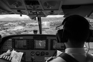 SEP 22, 2011 Pai, Thailand. - Pilots in the cockpit during a flight with commercial airplane....