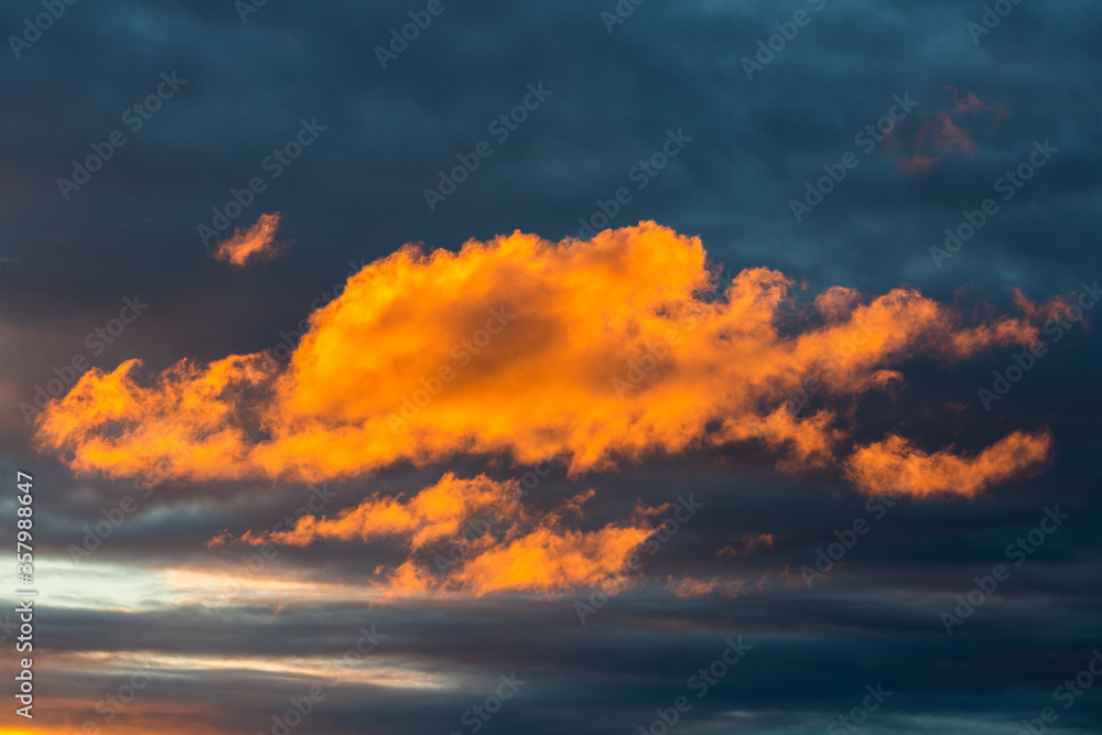 Wall mural Cloudy sky at sunset