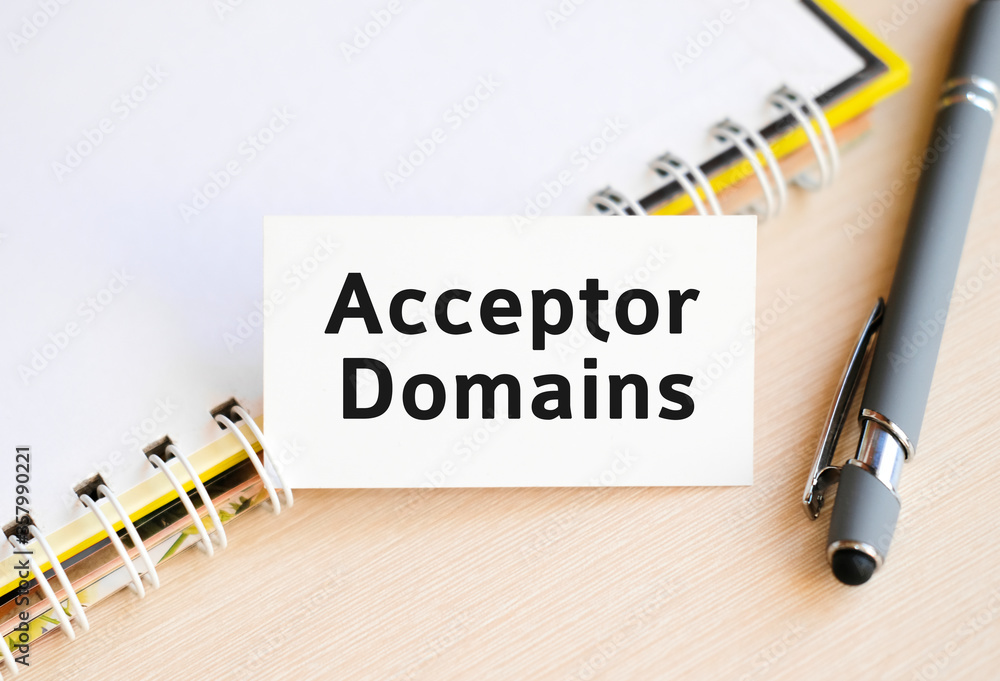 Aufkleber acceptor domain - text on a notebook with a spring and a gray pen
