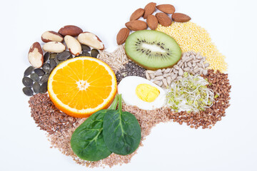 Nutritious ingredients, fruits and vegetables in shape of thyroid. Healthy food containing vitamins