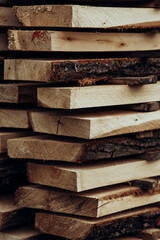 Piles of wooden boards in the sawmill, planking. 