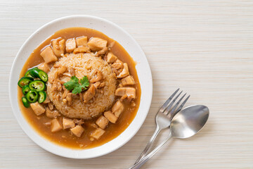 Chicken in brown sauce or gravy sauce with rice