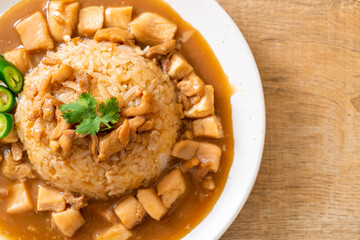 Chicken in brown sauce or gravy sauce with rice
