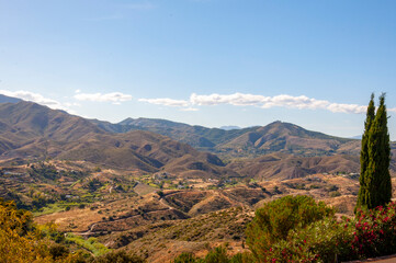 Panoramic view of settlements, fields and rural roads at the foot of the mountains in southern Spain