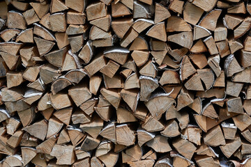 Abstract photo of a pile of natural wooden logs background