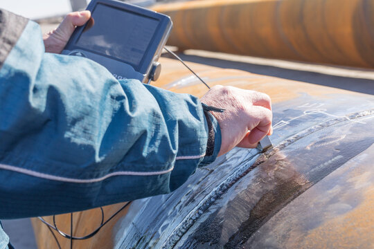 View of the ultrasonic testing for weld metal. Ultrasonic testing (UT) is a family of non-destructive testing techniques based on the propagation of ultrasonic waves in the object or material tested.