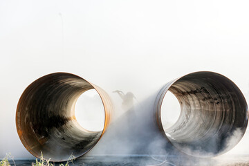 View of sandblasting before coating. Abrasive blasting, more commonly known as sandblasting, is the operation of forcibly propelling a stream of abrasive material against a surface.
