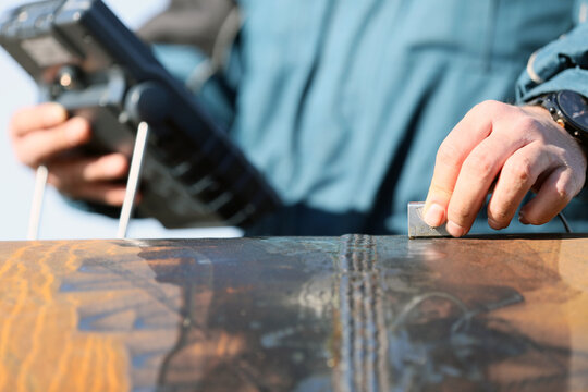 Professianal is inspection to pipe welds with ultrasonic testing. It is a family of non-destructive testing techniques based on the propagation of ultrasonic waves in the object or material tested.