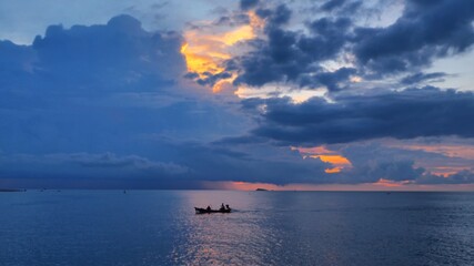 Sunset time above the ocean, water surface at sunset time, nature background 
