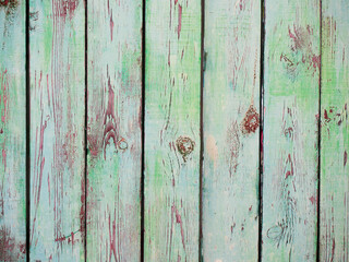 Old wooden fence with cracked paint texture