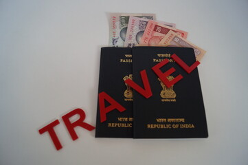 Indian passport with currency as background