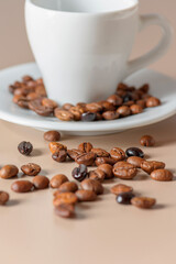 Roasted coffee beans and cup with copyspace. Roasted coffee beans of the morning mood.