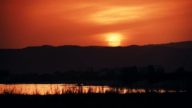 Red sunset over sea coastal landscape. Capi Corb, Mediterranean coast of Spain.