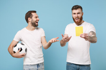 Perplexed men guys friends in white t-shirt isolated on blue background. Sport leisure concept....