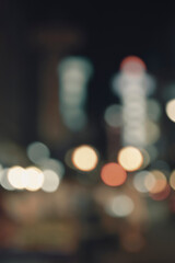 Abstract blur image of colorful night light city tower background