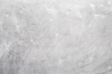 Abstract weathered texture stained old stucco light gray and aged paint concrete white wall background in rural room.
