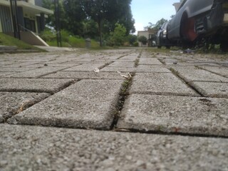 low-angle views of a paving block in a cluster housing