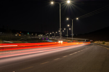 Fototapeta na wymiar Blurred car lights with long exposure