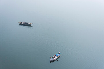Top view of boats are being sailed on the river ganges of Varanasi. Indian lifestyle, travel and tourism