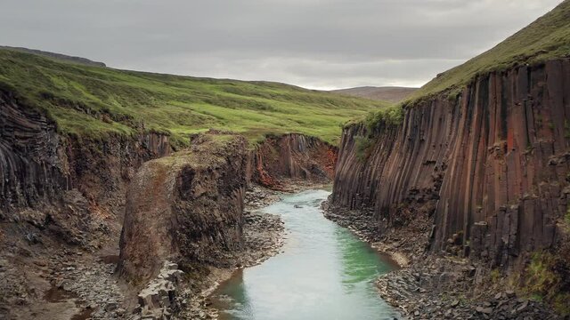 Stu&eth;lagil canyon in Iceland. Unique volcanic basalt column formation in J&ouml;kuldalur valley, Eastern Iceland. Tourist destination. Aerial shot. 