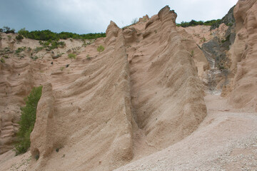 View of Lame Rosse, a canyon in the marche region during cloudy spring day in Italy