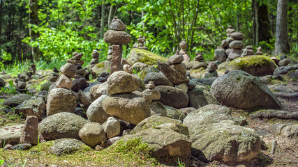 Pebble pyramids in forest