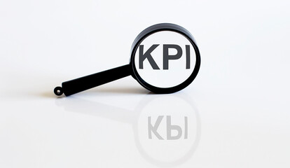 Magnifier with text KPI on the white background