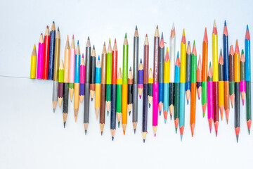 Color pens formed like heart pulse