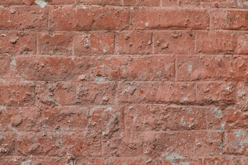 Naklejka premium brick wall Old solid brick wall with sun shadow background. texture for background