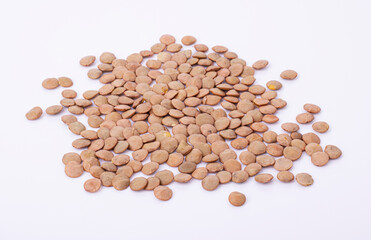 raw lentil seeds isolated on a white background. good nutrition