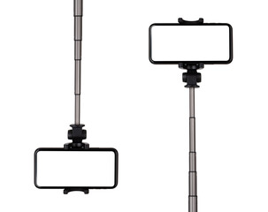 Smartphone with a white cut-out screen on a monopod. Selfie stick and smartphone on a white...