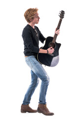 Cool relaxed macho young rocker man guitarist player side view. Full body length isolated on white...